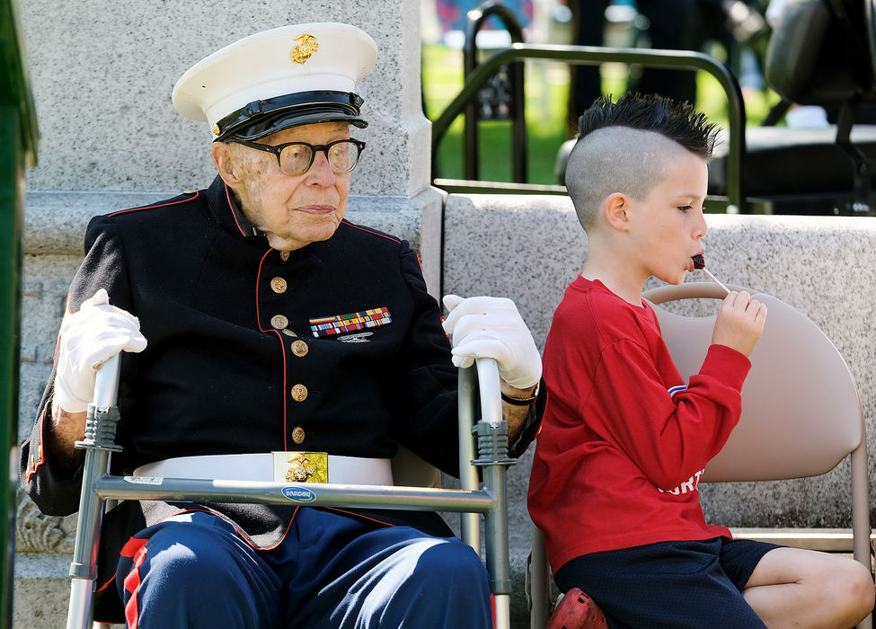 General News - 3rd placeWW II Veteran Corporal Bob Romaker, 93, sits with his great-grandson Jacobi Romaker, 7,  during a Memorial Day Service at Fort Meigs Cemetery in Perrysburg.  (Jeremy Wadsworth/The Blade)