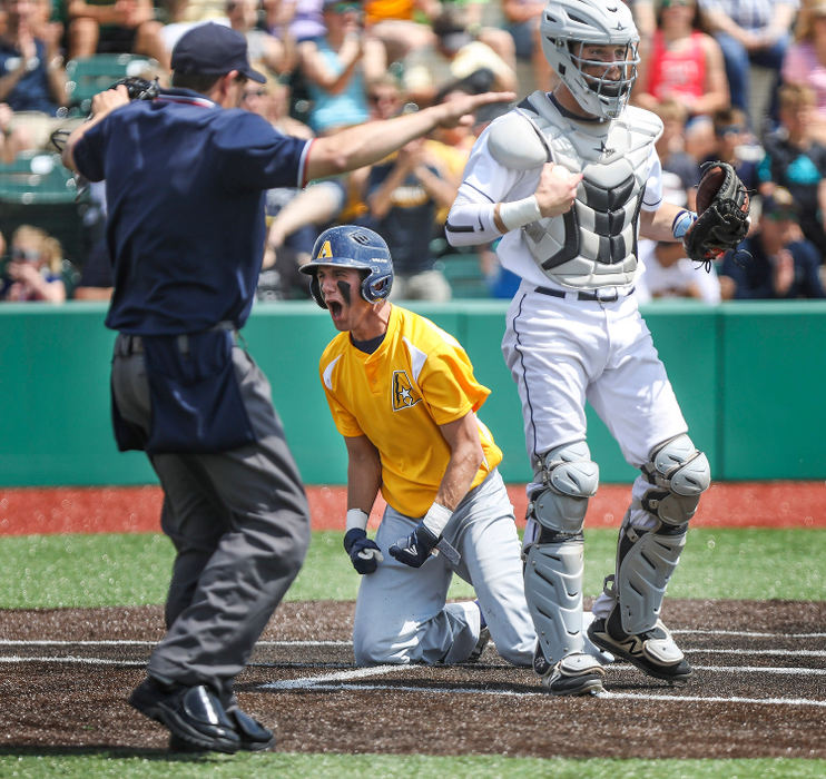 Sports Feature - 1st placeArchbold's TJ Rice (5) cheers after scoring a run during the Division III district championship game against Lake at Defiance High School. Archbold defeated Lake 15-0. (Rebecca Benson/The Blade)