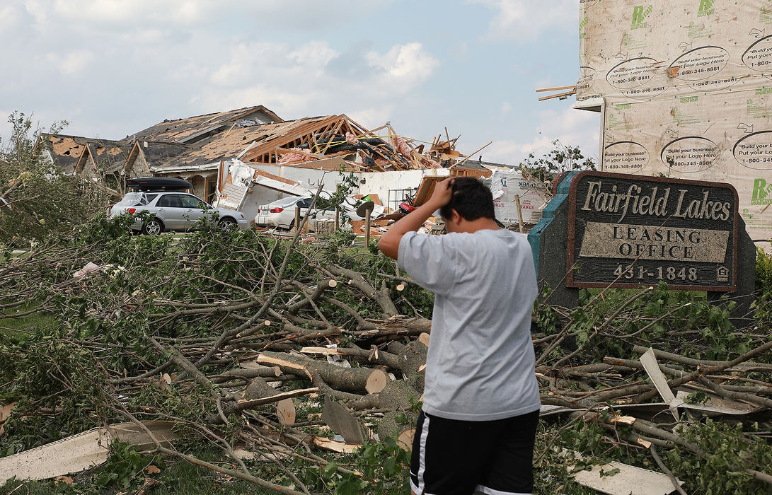 Spot News - 3rd placeA Beavercreek resident pulls his hair in frustration as he walks through the debris left behind after an overnight tornado devastated his neighborhood. (Bill Lackey/Springfield News-Sun)