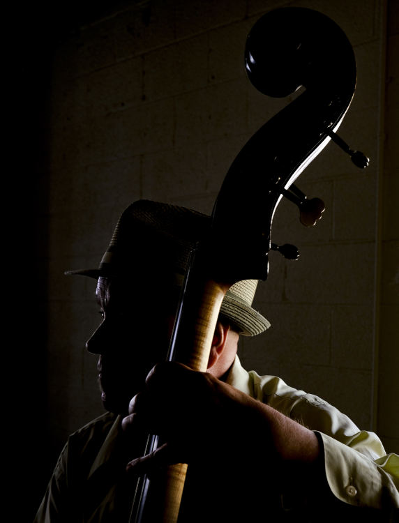 Portrait - 1st place - Kurt Krahnke plays the upright bass during the Salvation Army Volunteer Appreciation Luncheon Wednesday, May 11, 2022, at The Venues. (Jeremy Wadsworth - The Blade)  