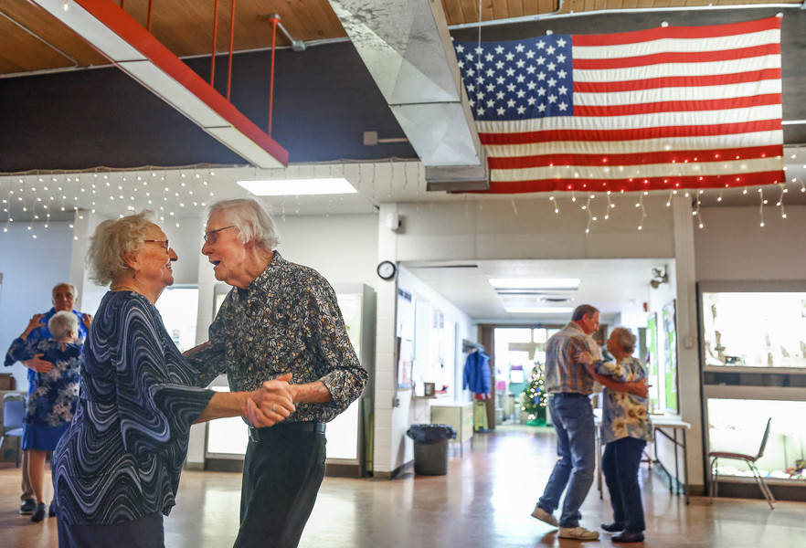 Feature - 3rd place - Leonore Gaynier, 94, dances with Jim Patton, 85, during the Club K Dance Party at the Eleanor Kahle Senior Center in Toledo.  (Jeremy Wadsworth / The Blade)