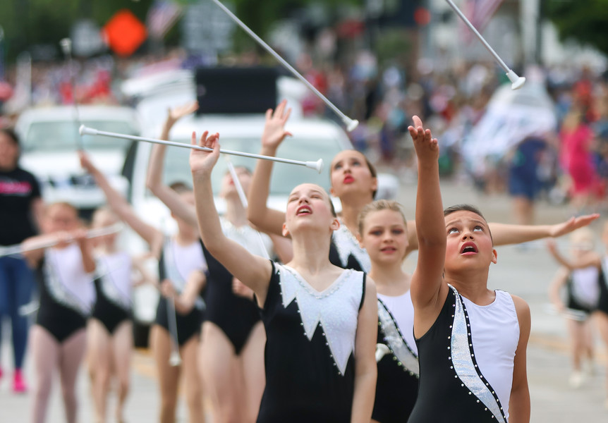 2nd -  Feature - 2nd place - Members of The Sophisticates, a twirling group, catch their batons during the Memorial Day parade in Perrysburg.  (Kurt Steiss / The Blade)   (Kurt Steiss / The Blade)