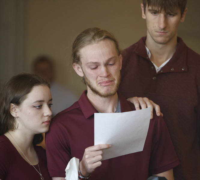 2nd -  General News - 2nd place - Preston Clark (center) he brother of Aiden Clark, fights back tears as he reads a statement during the sentencing of Hermanio Joseph in Clark County Common Pleas Court. Joseph was earlier found guilty of vehicular homicide after he causes a crash with a school bus that injured more than 20 students and killed 11-year-old Aiden Clark.  (Bill Lackey / Springfield News-Sun)   (Bill Lackey / Springfield News-Sun)