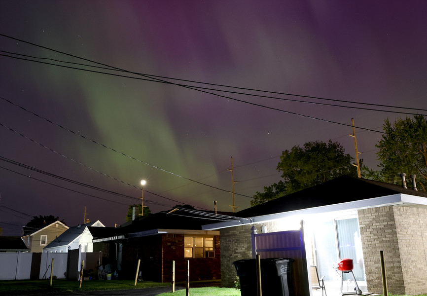 2nd -  General News - 3rd place - The northern lights, also known as aurora borealis, dances in the sky over West Toledo. This occurs when solar winds interact with our planet’s magnetosphere, and this particular solar storm was the strongest we’ve seen since 2003.  (Kurt Steiss / The Blade)   (Kurt Steiss / The Blade)