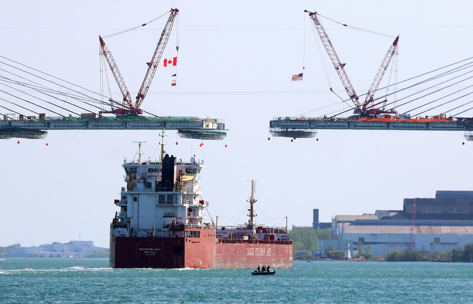 2nd -  General News - HM - Whitefish Bay, a Canadian-flagged freighter, moves southward in the Detroit River as the Canadian and United States spans of the Gordie Howe International Bridge nearly connect in Detroit. (Kurt Steiss / The Blade)   (Kurt Steiss / The Blade)