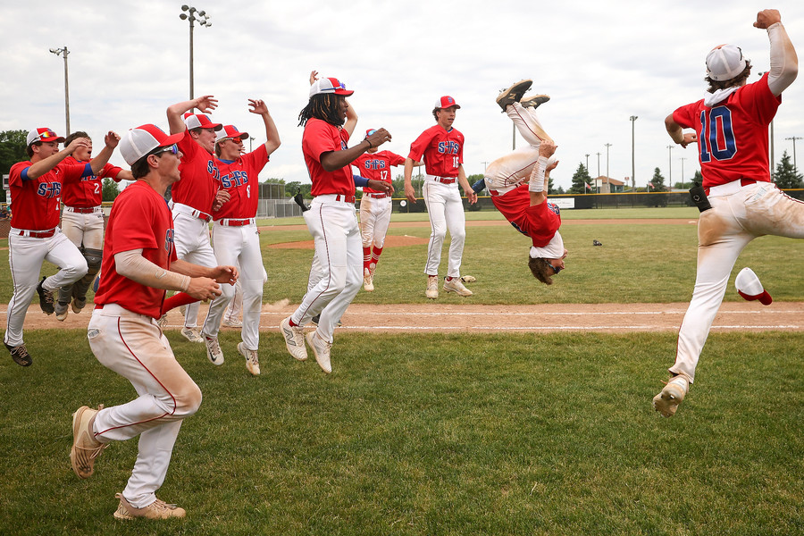 2nd -  Sports Feature - 1st place - St. Francis de Sales players celebrate defeating Whitmer 9-1 in the OHSAA Division I district final at Carter Park in Bowling Green. (Kurt Steiss / The Blade)   (Kurt Steiss / The Blade)