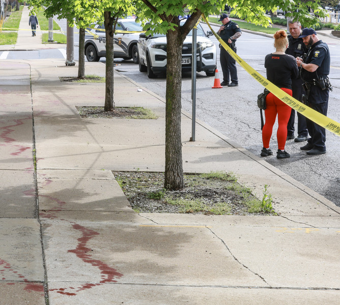 2nd -  Spot News - 2nd place - Police respond to a stabbing in front of The Blade building  in Toledo.  (Jeremy Wadsworth / The Blade)   (Jeremy Wadsworth / The Blade)