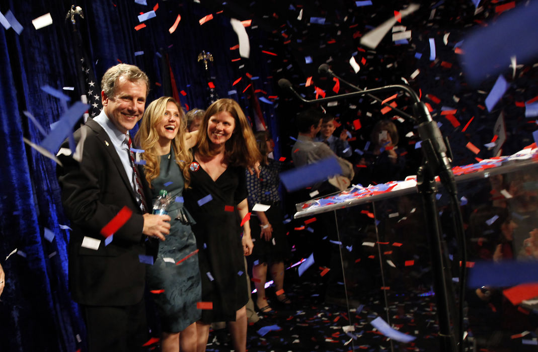 General News - 2nd placeSherrod Brown and family members celebrate the senator reclaiming his seat during the Ohio Democratic Party's election night festivities at the Hilton Columbus Downtown hotel.  (Adam Cairns / The Columbus Dispatch)