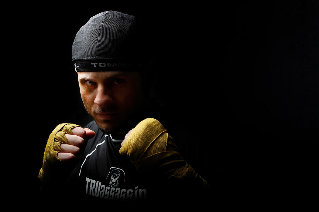 Portrait - 2nd placeWilkins "The Hispanic Hurricane" Santiago poses in the ring at Freddie's Gym in Lorain, Ohio.  (Sam Greene / The Morning Journal)