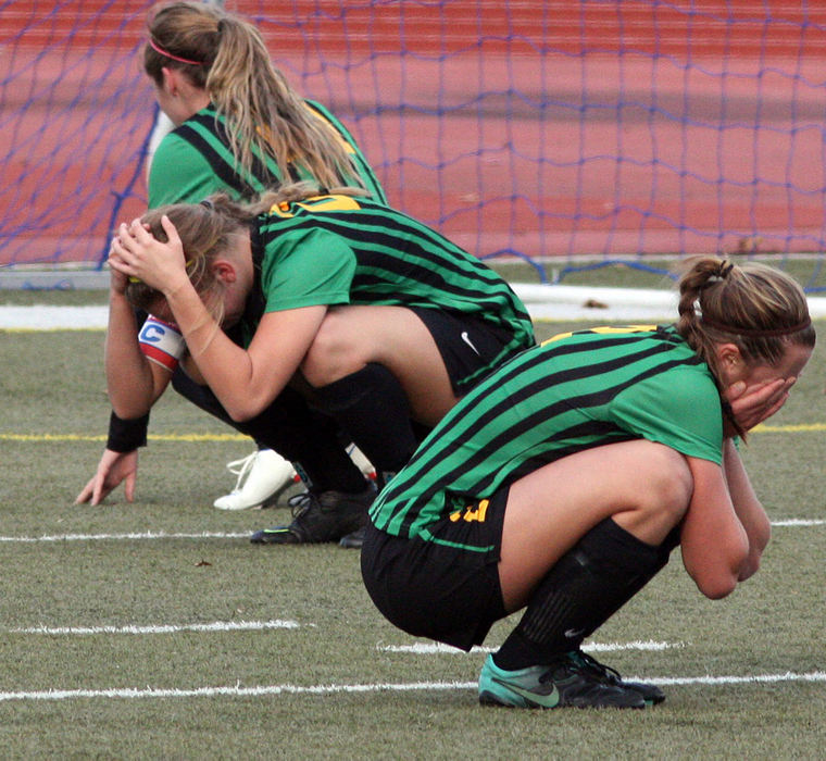 Sports Feature - 2nd placeDublin Jerome team reaction after letting in the winning Pickerington North goal in a second overtime. (Tim Revell / ThisWeek Newspapers)