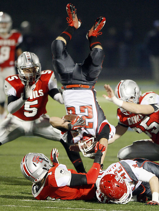 Sports - 2nd placeJohnstown's Hayden Bullard gets upended while running back a kick-off during their regional championship game against St. Clairsville at Zanesville High School. (Chris Parker / ThisWeek Newspapers)