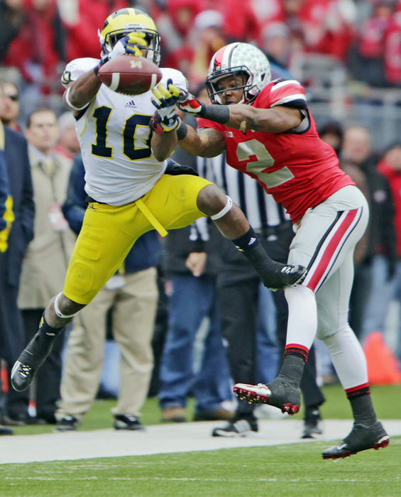 Sports - 3rd placeOhio State defensive back Christian Bryant (2) breaks up a pass intended for Michigan wide receiver Jeremy Gallon (10) in the fourth quarter at Ohio Stadium.   (Chris Russell / The Columbus Dispatch )