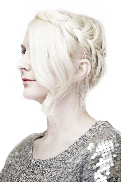 Portrait - 2nd place - Leslie Khy poses for a photograph as she wears a milkmaid braid created by hair stylist Robyn Wears at Kenneth's Salon in Worthington. Braids of all shapes and sizes are making a comeback.  (Eamon Queeney / The Columbus Dispatch)