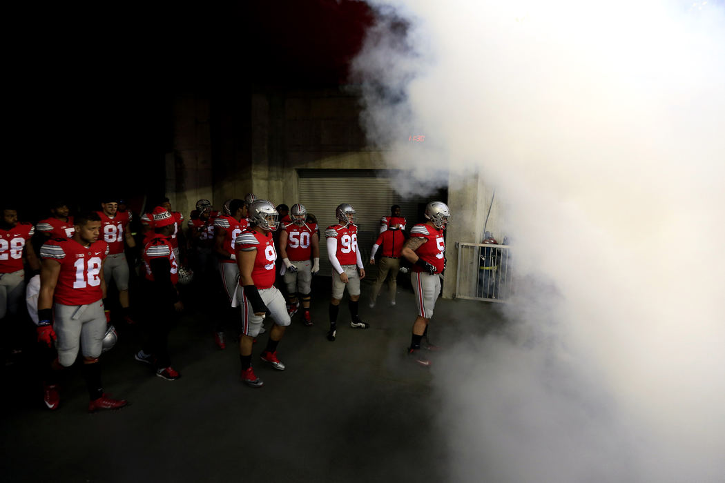 aSports Feature - 2nd place - Ohio State seniors wait to be called onto the field for senior day before their game against Michigan State Spartans at Ohio Stadium. (Kyle Robertson / The Columbus Dispatch)