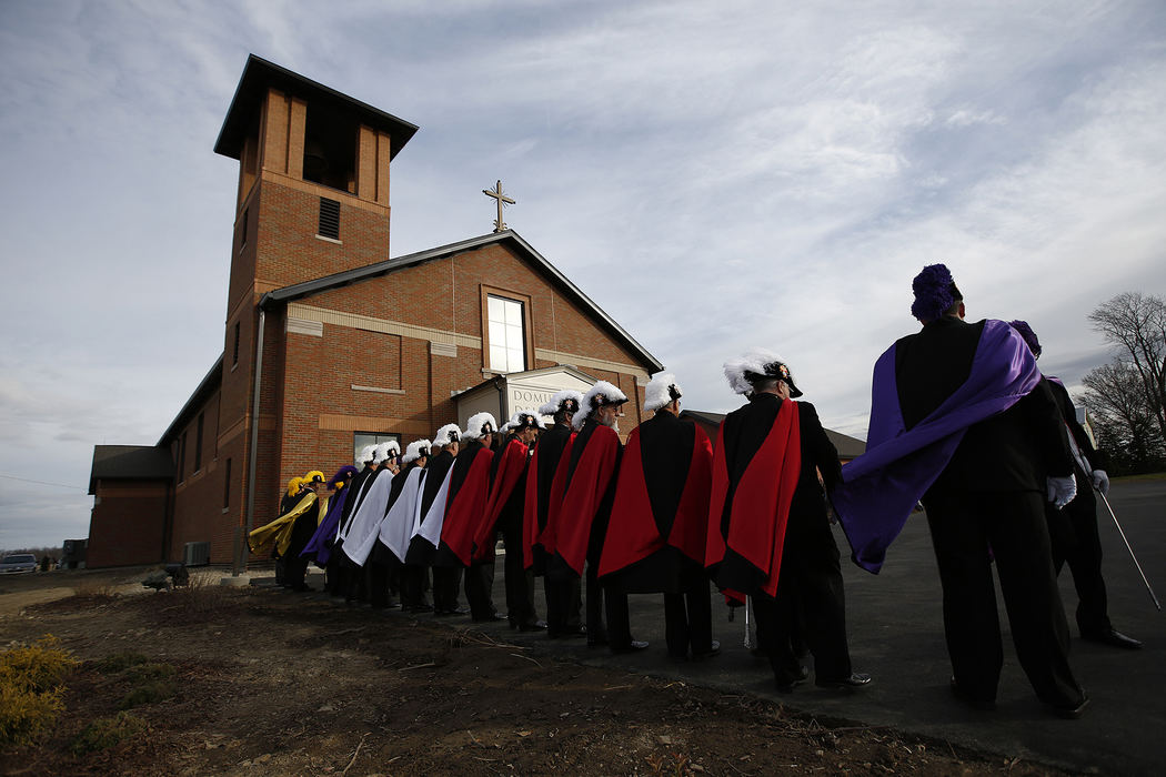 Story - 1st place - The Knights of Columbus line up outside before the dedication and consecration of the newly built Sacred Hearts Church in Cardington  on Thanksgiving day. The old Sacred Hearts Church was destroyed in a fire on Thanksgiving day in 2013 and to celebrate the brand new building, the first mass was led by Bishop Frederick Campbell of Columbus.  (Eamon Queeney / The Columbus Dispatch)