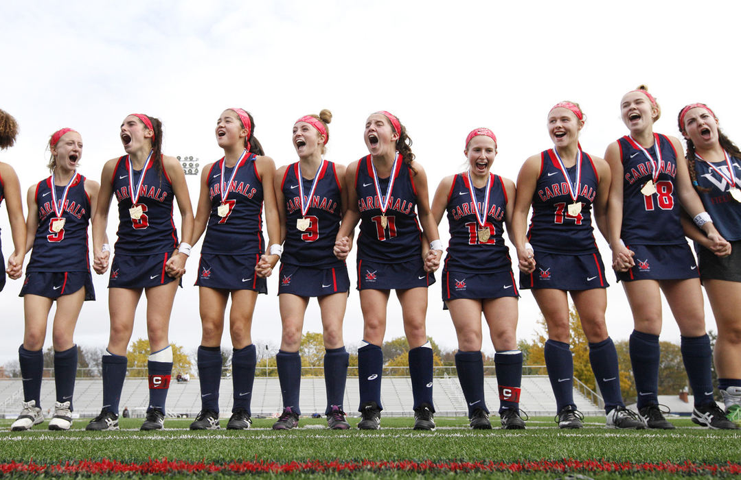 Sports Feature - 3rd place - Thomas Worthington players celebrate after they defeated Columbus Academy in the state field hockey championship at Upper Arlington High School. (Fred Squillante / The Columbus Dispatch)