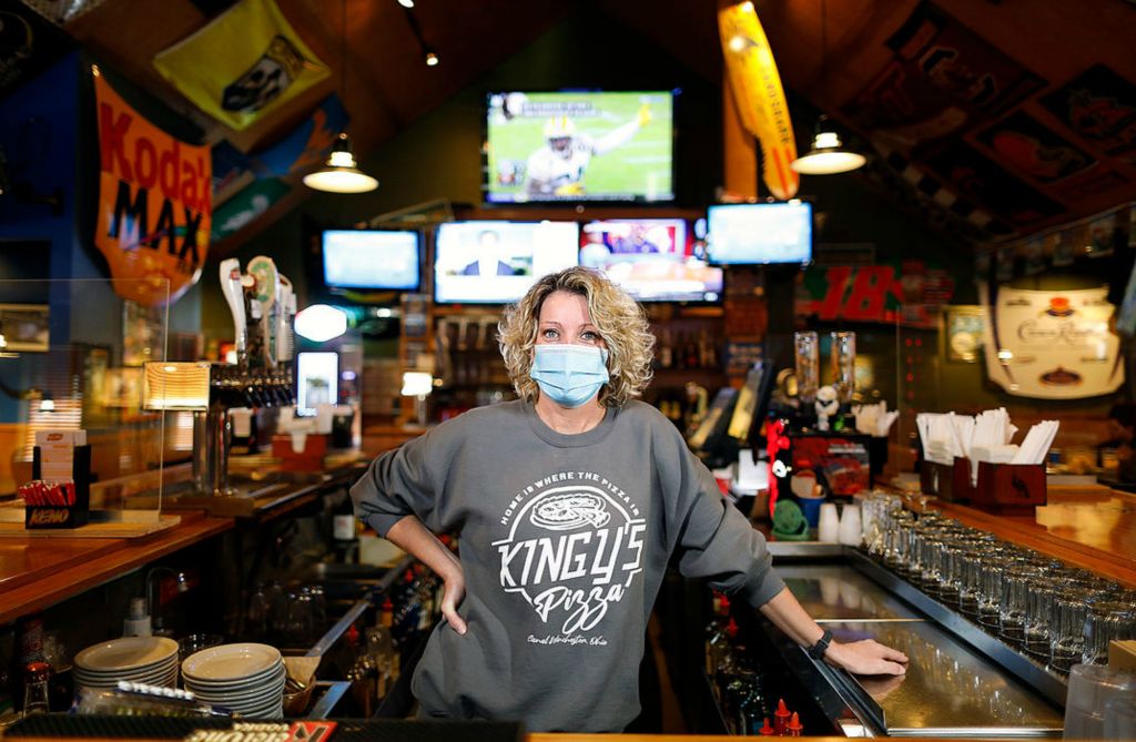 Portrait - 1st place - Carrie Ahlers has been working at Kingy's Pizza in Canal Winchester for 26 years. Kyle Robertson / The Columbus Dispatch