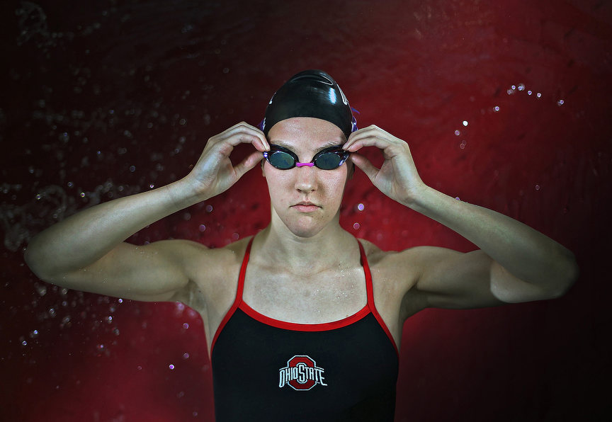 Portrait - 3rd place - Gameday+ Meet a Buckeye with Katie Trace of the women's swimming team.  Katie poses for a photo at the McCorkle Aquatic Center on the campus of Ohio State University. (Kyle Robertson / The Columbus Dispatch)