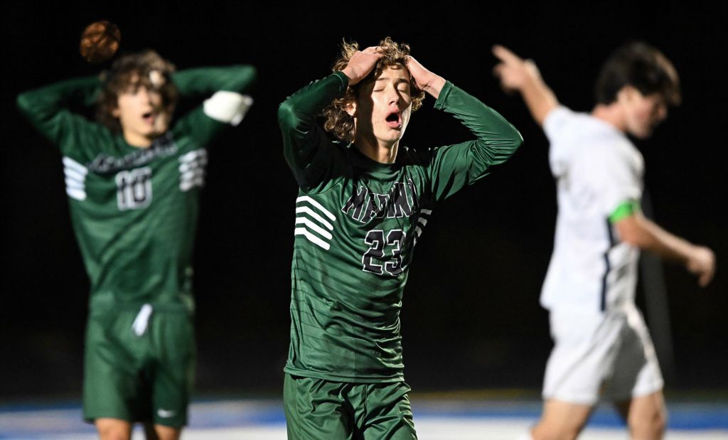 Sports Feature - 1st place - Medina midfielder Owen Alber (center) reacts after the ball was called out of bounds before a shot during the second half of a Division I state semifinal soccer game against St. Ignatius in Brunswick.  (Jeff Lange / Akron Beacon Journal)