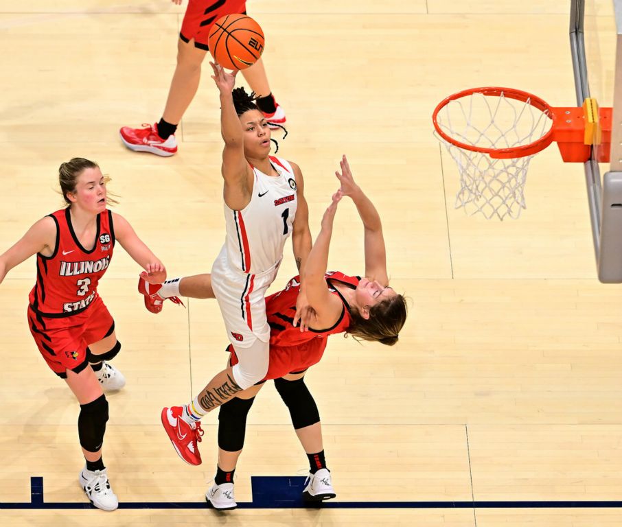 Sports - 2nd place - Dayton's Nayo Lear goes over the top of an Illinois State defender during the 3rd quarter of action. The Dayton Flyers fell to Illinois State 70-74 in overtime. (Erik Schelkun / Elsestar Images)