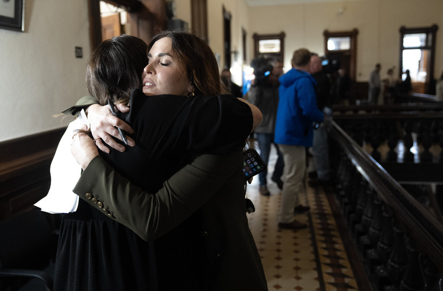 General News - 1st place - Essie Baird hugs a supporter at the Madison County Common Pleas Court in London, Ohio. Baird stated that former Upper Arlington teacher Joel Cutler had a sexual relationship with her beginning when she was 12 in 2000 continuing through 2003, she was in court to read a statement about her experience with him as he attempted to accept a plea deal from the prosecution.  (Brooke LaValley / The Columbus Dispatch)