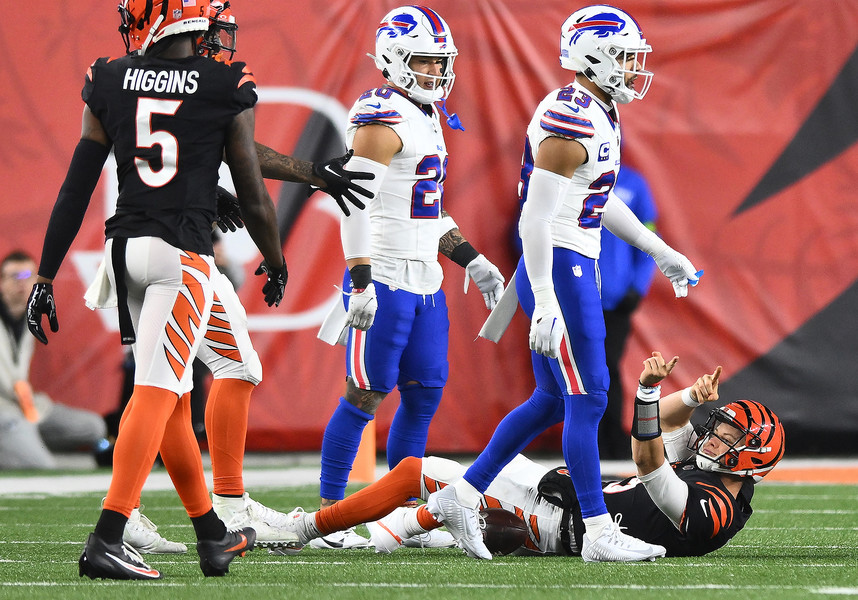 Sports Feature - HM - Bengals quarterback, Joe Burrow points his fingers to indicate a first down during their game against the Buffalo Bills at Paycor Stadium in Cincinnati. (Erik Schelkun / Elsestar Images)