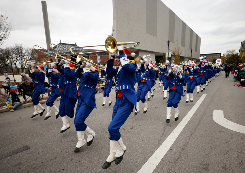 Feature - HM - Members of the Anthony Wayne High School marching band go by during the Blade Holiday Parade in Toledo. (Kurt Steiss / The Blade)