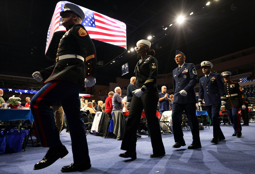 General News - 2nd place - A group of service members in an honor guard march out during the Veterans Appreciation Breakfast and Resource Fair at the University of Toledo’s Savage Arena. (Kurt Steiss / The Blade)