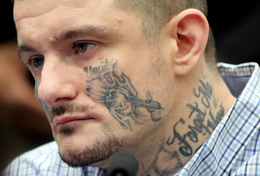 General News - HM - Defendant William Mozingo, 34, listens as Judge Susan Baker Ross sentences him to 25 to 31 1/2 years in prison for kidnapping and holding a Chardon woman against her will and assaulting her at the Summit County Courthouse in Akron. (Jeff Lange / Akron Beacon Journal)