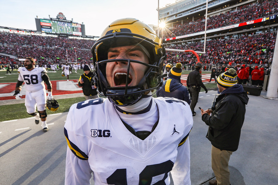 Sports Feature - 3rd place - Michigan’s Tommy Doman celebrates their 13-10 win over Ohio State during a Big10 football game at Ohio Stadium in Columbus. (Rebecca Benson / The Blade)