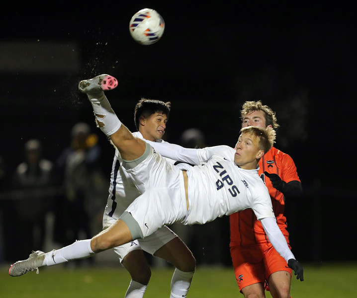 Sports - 2nd place - Akron forward Emil Jaaskelainen (9) attempts a shot against the Princeton Tigers during the second half of a soccer match in the first round of the NCAA Division I Men’s Soccer Tournament on Thursday, Nov. 21, 2024, in Akron, Ohio. (Jeff Lange / Akron Beacon Journal)