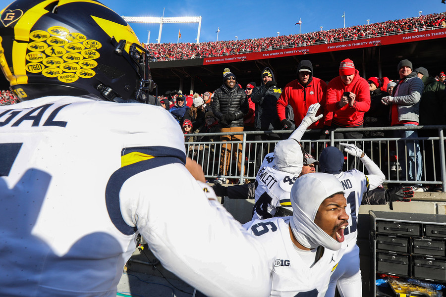 Story - 1st place - Michigan players heckle Ohio State fans during the final seconds of their game during a at Ohio Stadium in Columbus. (Rebecca Benson / The Blade)