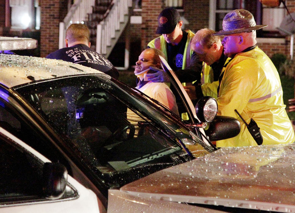 Spot News - 2nd place - Springfield police officer Geoffrey Ashworth and the female driver of a Pontiac Sunfire were transported to Springfield Regional Medical Center with injuries after a two-car crash near the intersection of East High Street and Raffensperger Avenue. (Barbara J. Perenic / Springfield News-Sun)