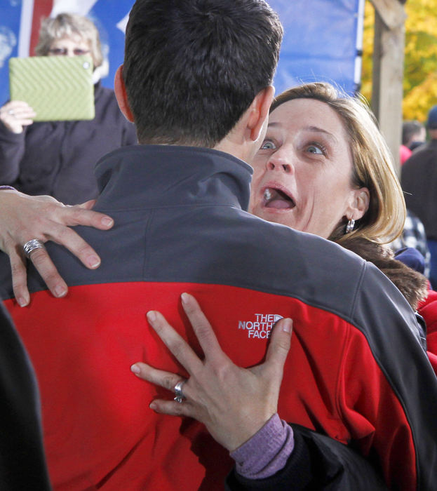 General News - HMAn excited supporter in the crowd hugs Republican vice presidential candidate Paul Ryan during a rally at Young’s Jersey Dairy. Ryan gave a brief speech and then shook hands and posed for photos with supporters in the crowd of approximately two thousand people.  (Barbara J. Perenic / Springfield News-Sun)