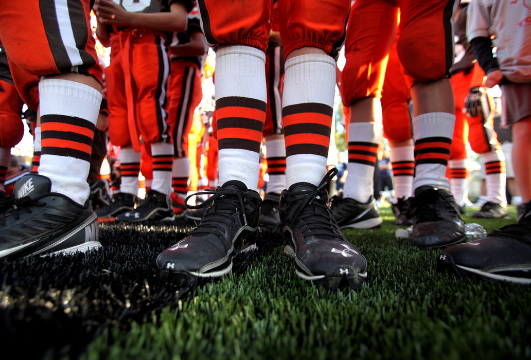 Sports Feature - HMYouth football players on the Lou Groza Football League stand on the brand new field during a Gatorade Junior Training Camp at the new Lou Groza Field at Roehm Middle School in Berea. Through a partnership between the Browns, Berea City School District and the Lou Groza Football League, a new football field/stadium was constructed at Roehm Middle School as a way to pay tribute to the late Lou Groza.  ( Lisa DeJong / The Plain Dealer)