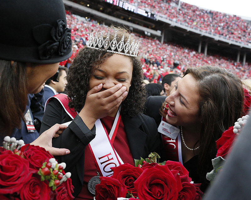 General News - HM - Chasmine Anderson (left) is congratulated by other nominees was named the 2014 homecoming queen before the Buckeyes game against Rutgers . (Barbara J. Perenic / The Columbus Dispatch)