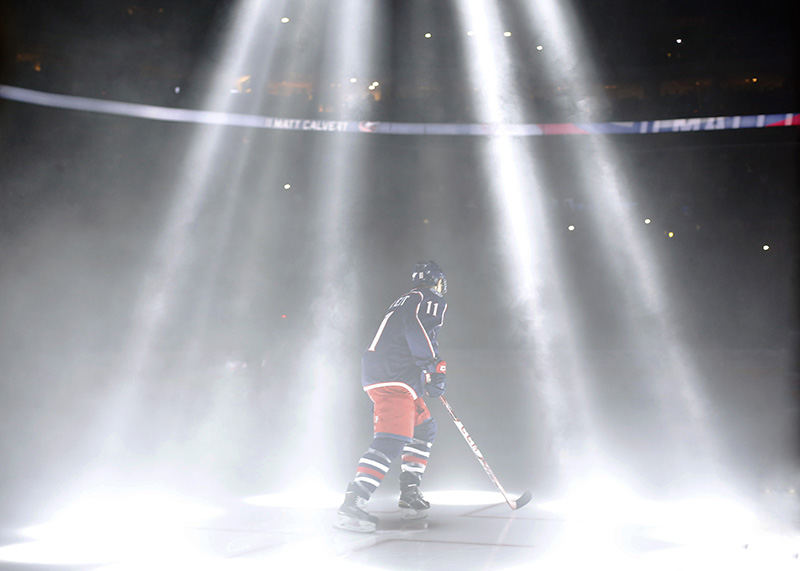 sStory - 1st place - Columbus Blue Jackets left wing Matt Calvert (11) waits to be introduced on ice before their opening game against the New York Rangers at Nationwide Arena. (Kyle Robertson / The Columbus Dispatch)