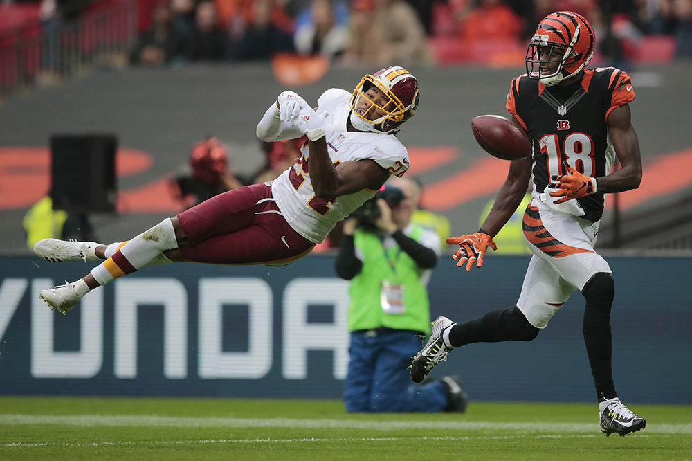 SSports - HM - Washington cornerback Josh Norman (24) breaks up a pass intended for Cincinnati Bengals wide receiver A.J. Green (18) in the third quarter at Wembley Stadium in London, England.  (Kareem Elgazzar / Cincinnati Enquirer)