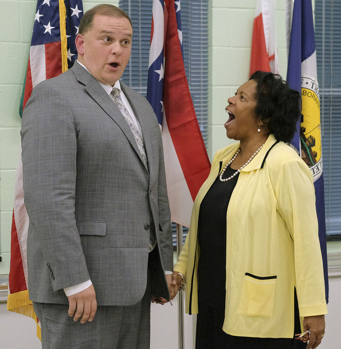    General News - HM - Mayoral candidate Wade Kapszukiewicz (left) and Mayor Paula Hicks-Hudson joke around before a candidates forum at the Friendship Park shelter house in Toledo. (Jeremy Wadsworth / The Blade)