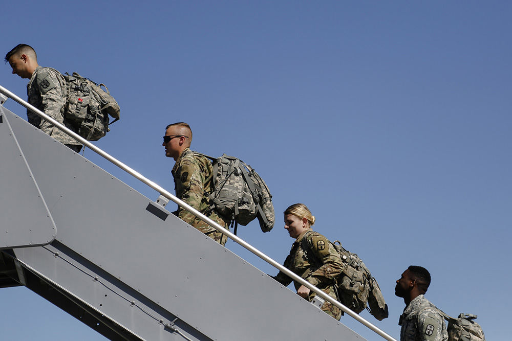 MTGeneral News - HM - Ohio National Guardsmen board a KC-135 aircraft as they prepare for deployment at Rickenbacker Air Force Base in Columbus. 60 guardsmen from the 285th Area Support Medical Company in Columbus and the 137th Signal Company in Newark are heading to Puerto Rico to help with Hurricane Maria relief efforts. (Joshua A. Bickel / The Columbus Dispatch)