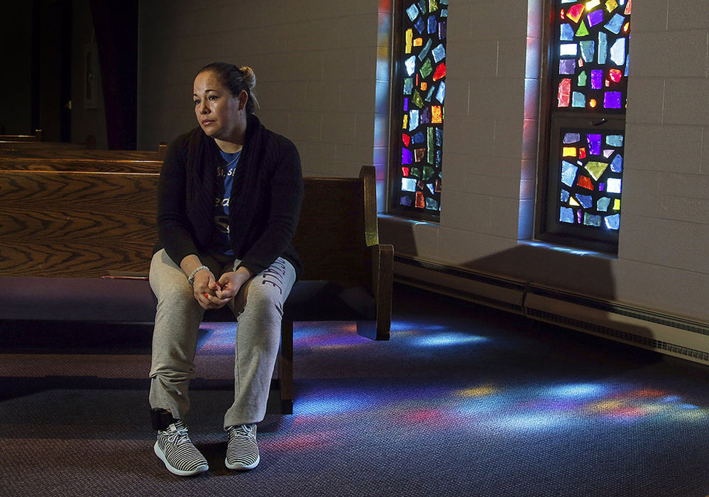 Portrait - 3rd place - Edith Espinal wearing a ankle monitor, and staying in a sanctuary at a local church to avoid deportation by immigration authorities. (Tom Dodge / The Columbus Dispatch)