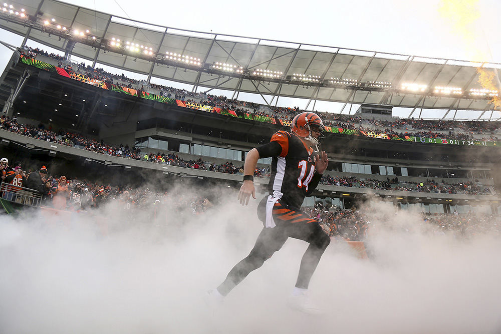 SSports Feature - HM - Cincinnati Bengals quarterback Andy Dalton (14) is introduced before a game against the Indianapolis Colts at Paul Brown Stadium in Cincinnati.  (Kareem Elgazzar / The Cincinnati Enquirer)