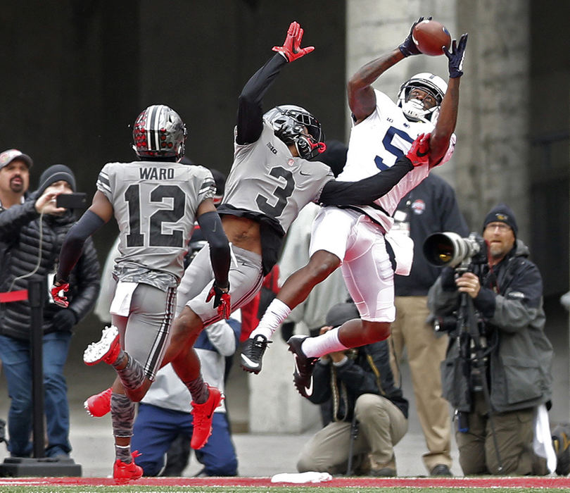 Sports - 1st place - Ohio State cornerback Damon Arnette (3) can't stop Penn State wide receiver DaeSean Hamilton (5) from making a touchdown catch during the 1st half of their game in Ohio Stadium on October 28.   (Kyle Robertson / The Columbus Dispatch)