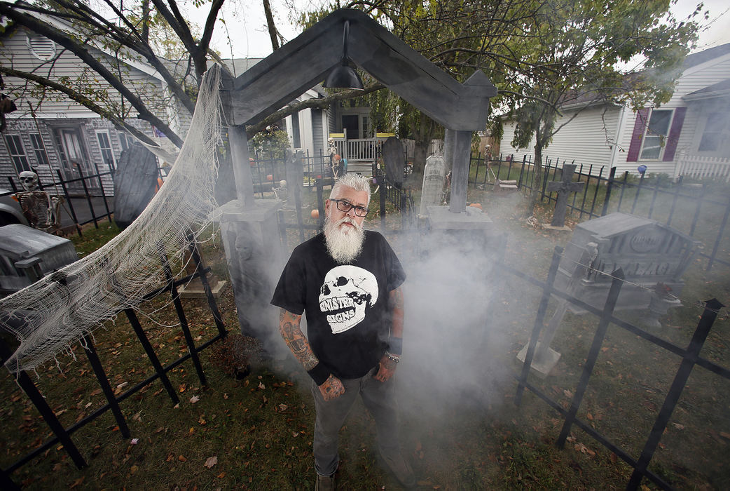 Portrait - HMTodd Kensler built and designed all of his Halloween display at house in Hilliard. (Kyle Robertson / The Columbus Dispatch)