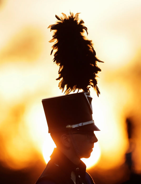 Sports Feature - 3rd placeA member of the Olentangy High School Marching Band waits to perform before the game between the Olentangy Liberty Patriots and the Olentangy Braves in Lewis Center. (Maddie Schroeder / The Columbus Dispatch)