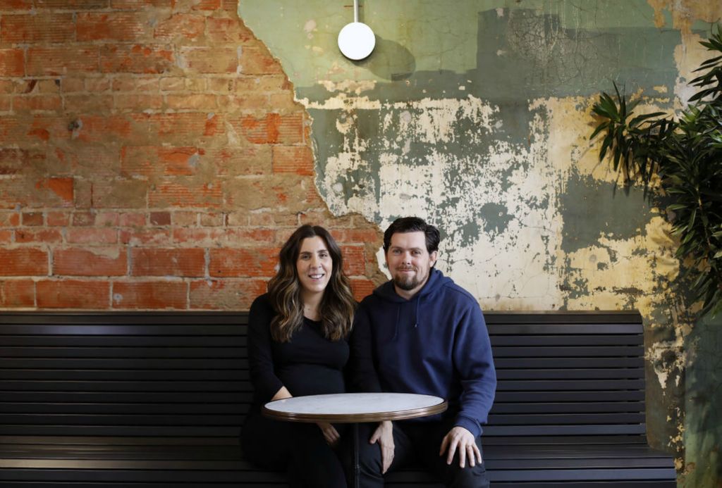 Portrait - 2nd place - The owners of Fox in the Snow, Lauren Culley and Jeff Excell, are opening up a sandwich shop called Icarus. The two poses for a photo inside the shop. (Kyle Robertson / The Columbus Dispatch) 