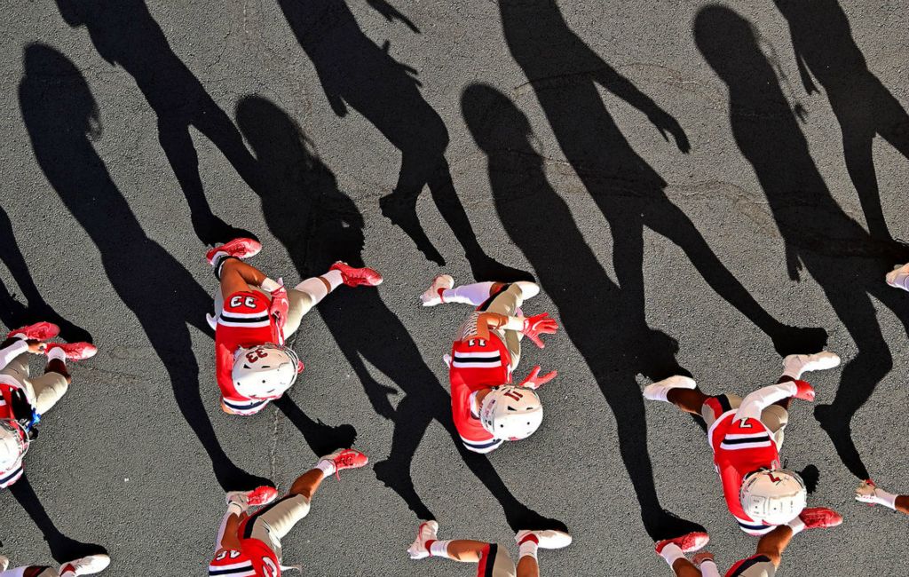 Sports Feature - 2nd place - The Dayton Flyer walk into welcome stadium prior to their game against Marist. (Erik Schelkun / Elsestar Images) 