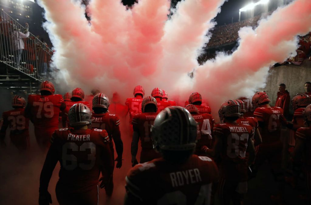 Sports Feature - HM - Ohio State takes the field before the start of their game against Penn State at Ohio Stadium in Columbus. (Kyle Robertson / The Columbus Dispatch) 