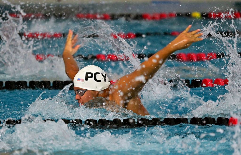 Sports - 1st place - Ethan Hoskins of the PCY swim club competes in the 50 meter butterfly at the Powel Crosley YMCA in Cincinnati. (Erik Schelkun / Elsestar Images) 