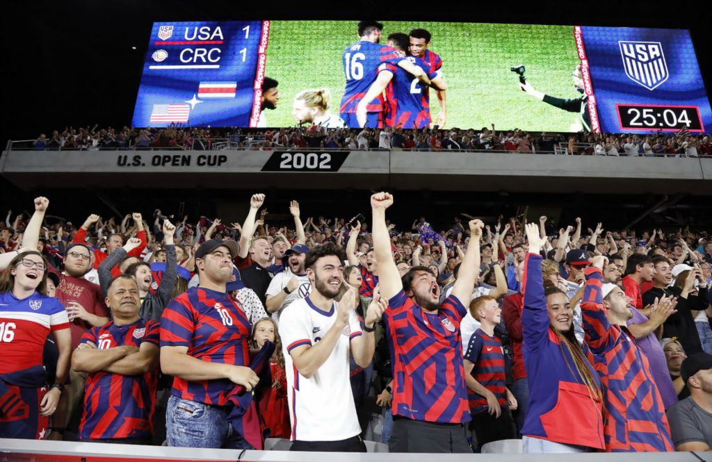 Story - 1st place - United States fans celebrate after United States' defender Sergiño Dest (2) scored a goal against Costa Rica in the first half in their World Cup qualifier at Lower.com Field in Columbus. (Kyle Robertson / The Columbus Dispatch) 